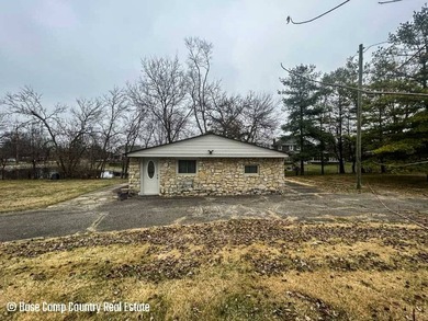 This 1 bed, 1 bath stone home sits on nearly half an acre. It is - photo 4