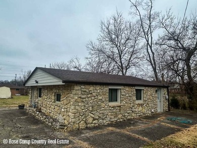 This 1 bed, 1 bath stone home sits on nearly half an acre. It is - photo 5