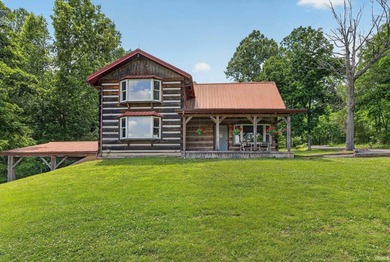 Enjoy lake living with this cozy cabin-style home on beautiful - photo 6