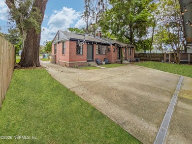 *Charming brick home with timeless curb appeal under a canopy of - photo 17