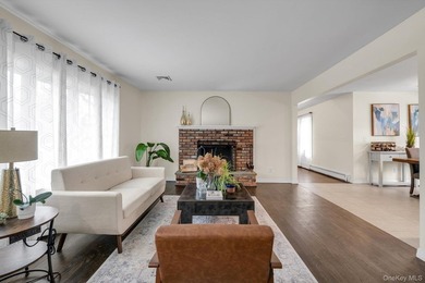 Nestled on a quiet, tree-lined street in a highly desirable - photo 2