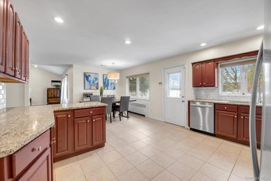 Nestled on a quiet, tree-lined street in a highly desirable - photo 8