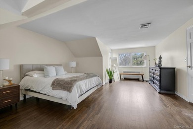 Nestled on a quiet, tree-lined street in a highly desirable - photo 10