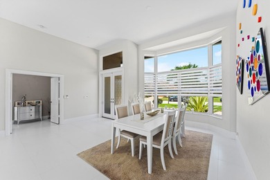 Experience modern luxury in this stunningly renovated 4-bedroom - photo 9