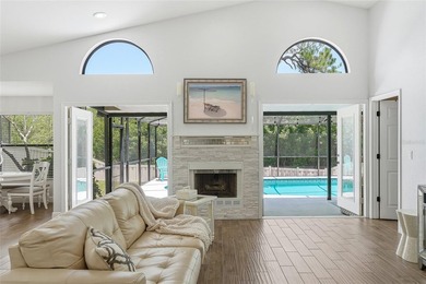 An exquisitely updated residence within the gated community of - photo 3
