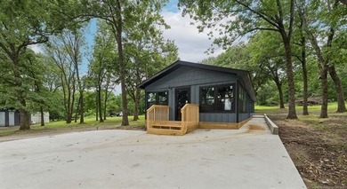 Endless development potential meets modern lakeside living! This - photo 3