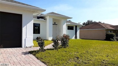 Welcome to this beautiful home located at 1201 NE 18th Pl, Cape - photo 2