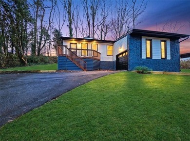 This beautifully updated split-level home offers 3 bedrooms and - photo 2