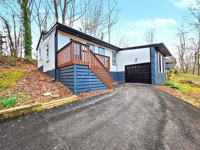 This beautifully updated split-level home offers 3 bedrooms and - photo 3