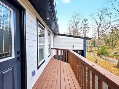 This beautifully updated split-level home offers 3 bedrooms and - photo 4