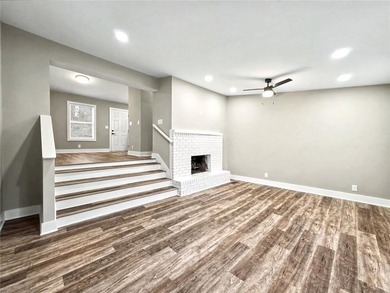 This beautifully updated split-level home offers 3 bedrooms and - photo 5
