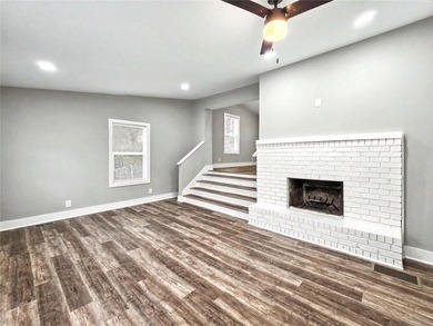 This beautifully updated split-level home offers 3 bedrooms and - photo 6