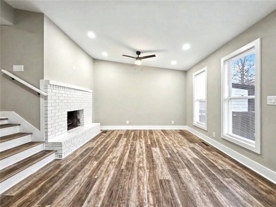 This beautifully updated split-level home offers 3 bedrooms and - photo 7