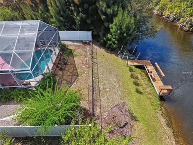 Waterfront living in Rotonda Lakes! This beautifully maintained - photo 7