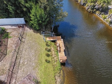 Waterfront living in Rotonda Lakes! This beautifully maintained - photo 8