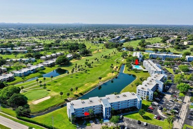 Nestled in a vibrant 55+ community, this completely remodeled in - photo 2