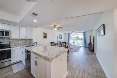 Nestled in a vibrant 55+ community, this completely remodeled in - photo 3