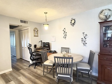 Beautifully updated furnished 1 bedroom, 1.5 bath condo located - photo 5