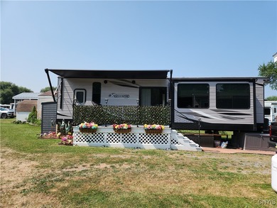 Turnkey Lakeside Retreat - A Lightly Used, Like-New Mobile Home - Lake Lot For Sale in Adams, New York