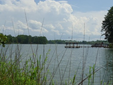 Great waterfront  lot with small dock already in place. This is - Lake Lot For Sale in Cross Hill, South Carolina