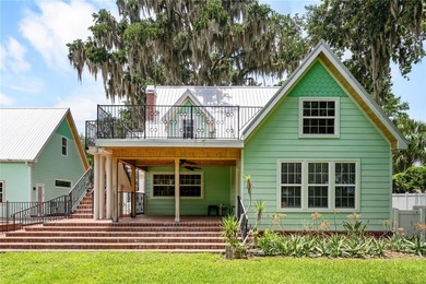 An extraordinary DeLand lakefront estate set on 5+ acres along - photo 1