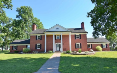 Charming and eloquent 5 bedroom home located on over 12.6 acres - Lake Home For Sale in Winamac, Indiana