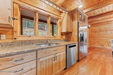 A classic Lincoln Log home set on a private 3+ acre lot, this - photo 17