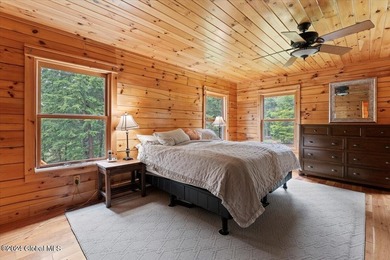 A classic Lincoln Log home set on a private 3+ acre lot, this - photo 21