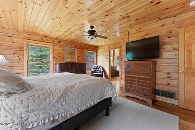 A classic Lincoln Log home set on a private 3+ acre lot, this - photo 22
