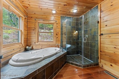 A classic Lincoln Log home set on a private 3+ acre lot, this - photo 24