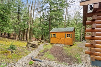 A classic Lincoln Log home set on a private 3+ acre lot, this - photo 39