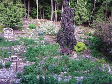 A classic Lincoln Log home set on a private 3+ acre lot, this - photo 47