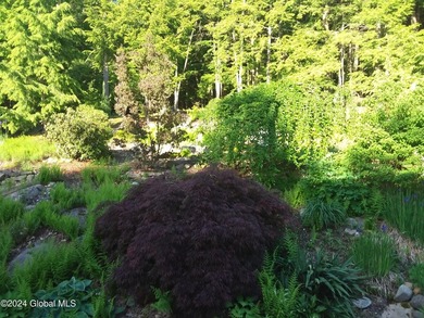 A classic Lincoln Log home set on a private 3+ acre lot, this - photo 49