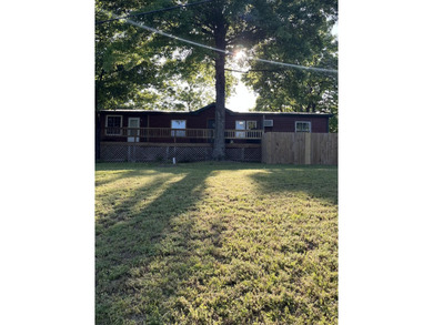 Enjoy the best of Ozark living in this charming and very - photo 4