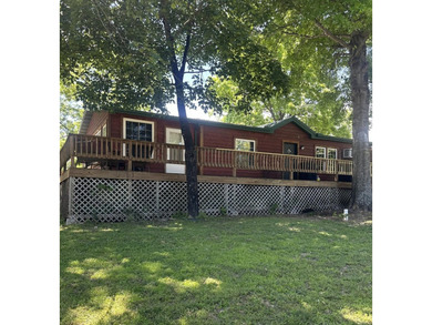 Enjoy the best of Ozark living in this charming and very - photo 5