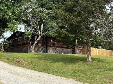 Enjoy the best of Ozark living in this charming and very - photo 8