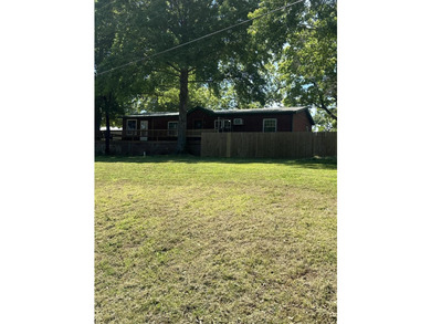 Enjoy the best of Ozark living in this charming and very - photo 9