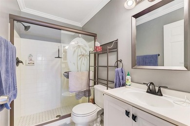 This bright 2-bedroom, 2-bath corner unit has been thoughtfully - photo 22