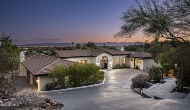 Set on a quiet acre in the heart of Paradise Valley, this