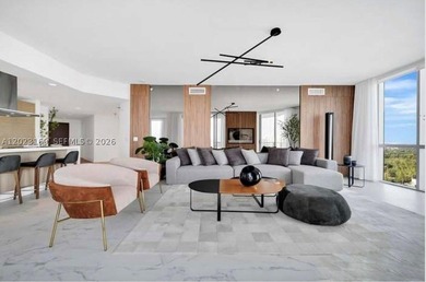 GORGEOUS CORNER 3 BEDROOM RESIDENCE WITH PANORAMIC WATER - photo 5
