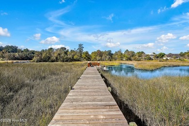 Tucked along a peaceful tidal creek, 101 Teal Circle is the kind - photo 50