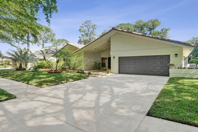 Welcome to 2401 NW 39th St! Situated in the highly sought-after - photo 1