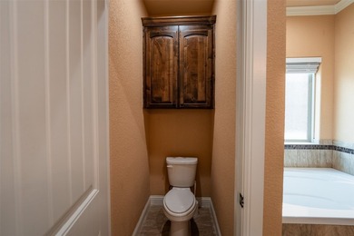 Welcome home to this charming retreat tucked into an established - photo 14