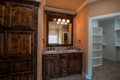 Welcome home to this charming retreat tucked into an established - photo 17