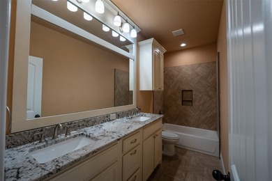 Welcome home to this charming retreat tucked into an established - photo 22