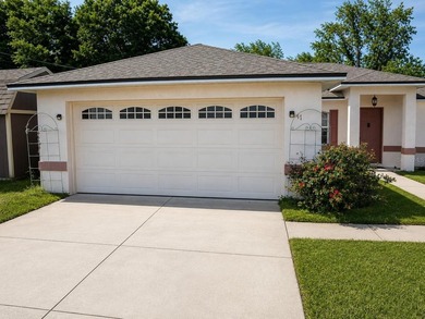 Welcome to Silver Springs Shores! This inviting 3-bedroom - photo 1