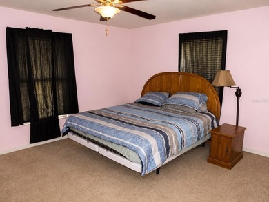 Welcome to Silver Springs Shores! This inviting 3-bedroom - photo 9