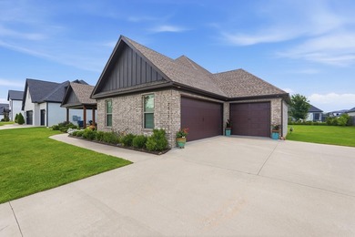 Luxury single-story brick home in The Pointe phase of the gated - photo 9
