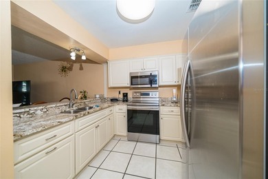 NEW ROOF 2025 | UPDATED KITCHEN | PRIVATE FENCED YARD | LOW HOA - photo 3