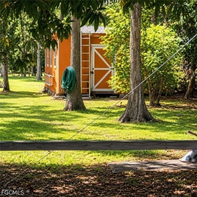 Welcome to this beautiful, maintained tropical ranch-style - photo 14